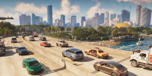 Screenshot resmi GTA 6 dari pengumuman radio Rockstar: mobil-mobil melaju di jalan layang Leonida dengan gedung pencakar langit Vice City di latar belakang